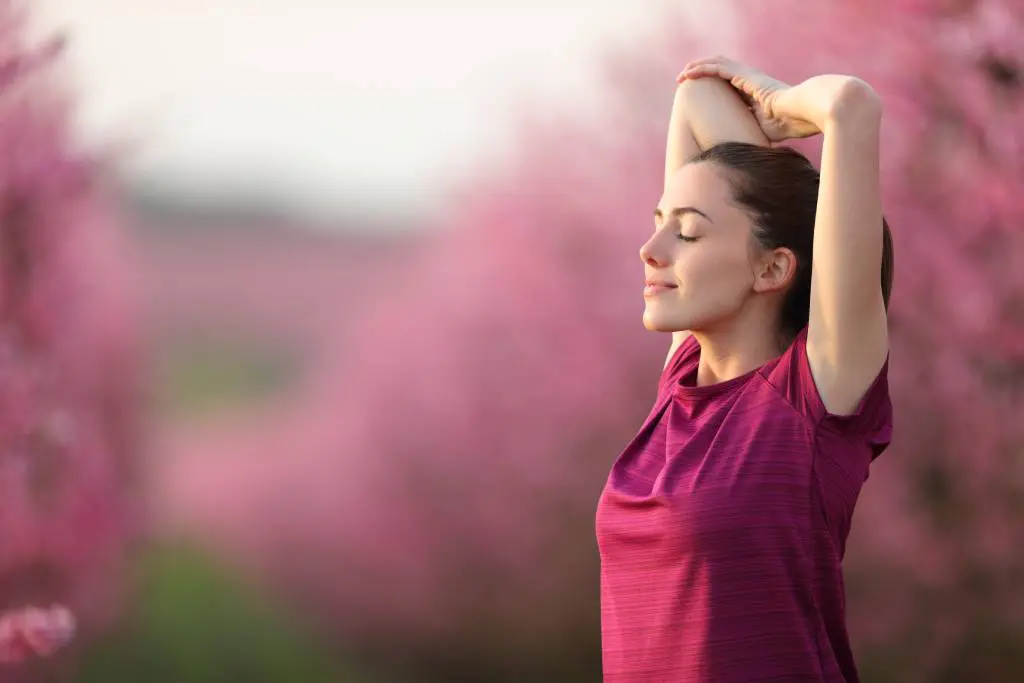 A thyroid RFA patient stretches blissfully after a run.