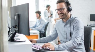 STARMED support team member assisting a client on the phone.